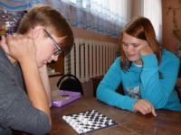 Шашечно-шахматные турниры в библиотеке